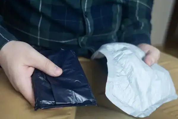 image of man holding stool incontinence Leicester products